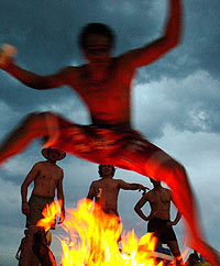 guyjumpingbonfire.jpg